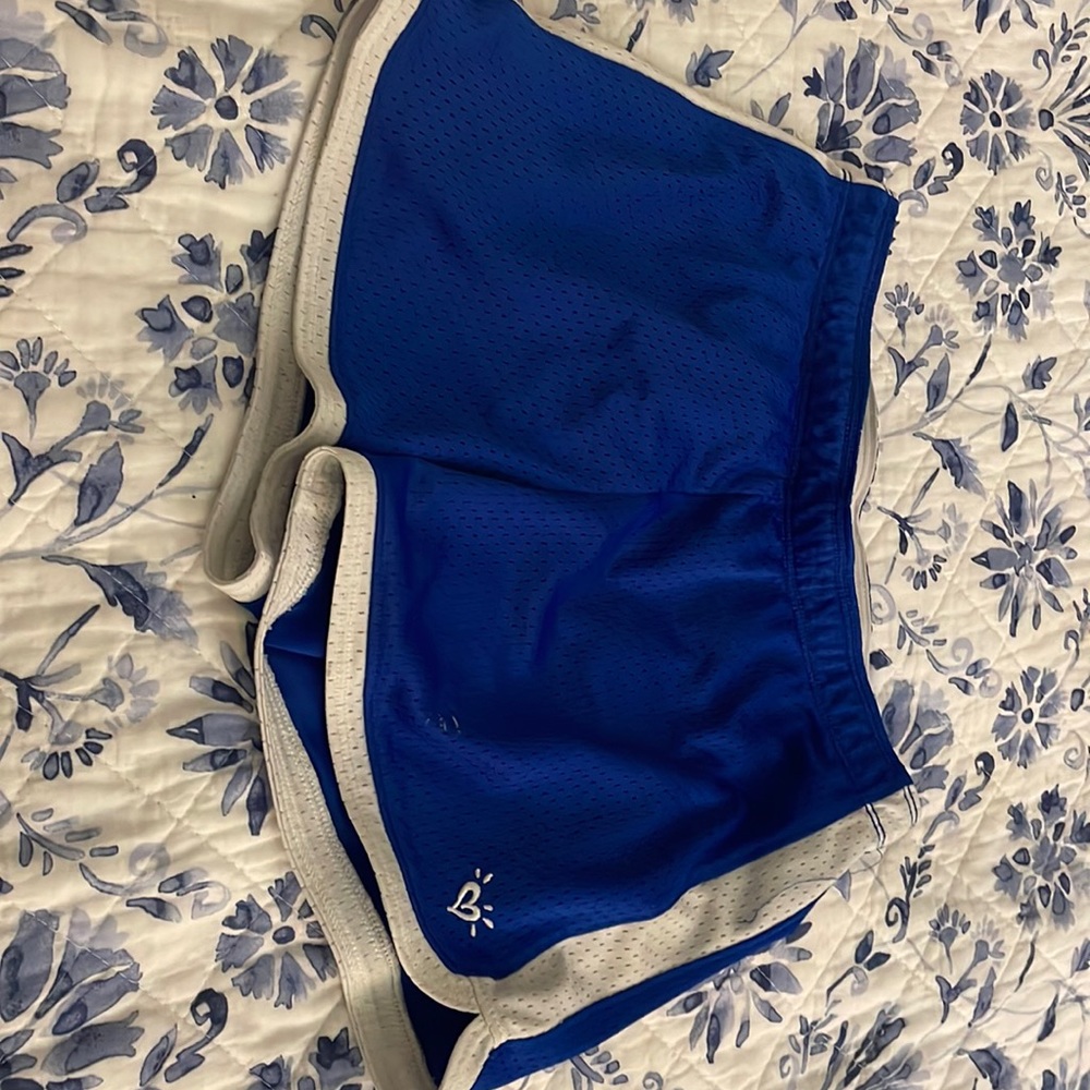 Justice kids blue and white shorts.
